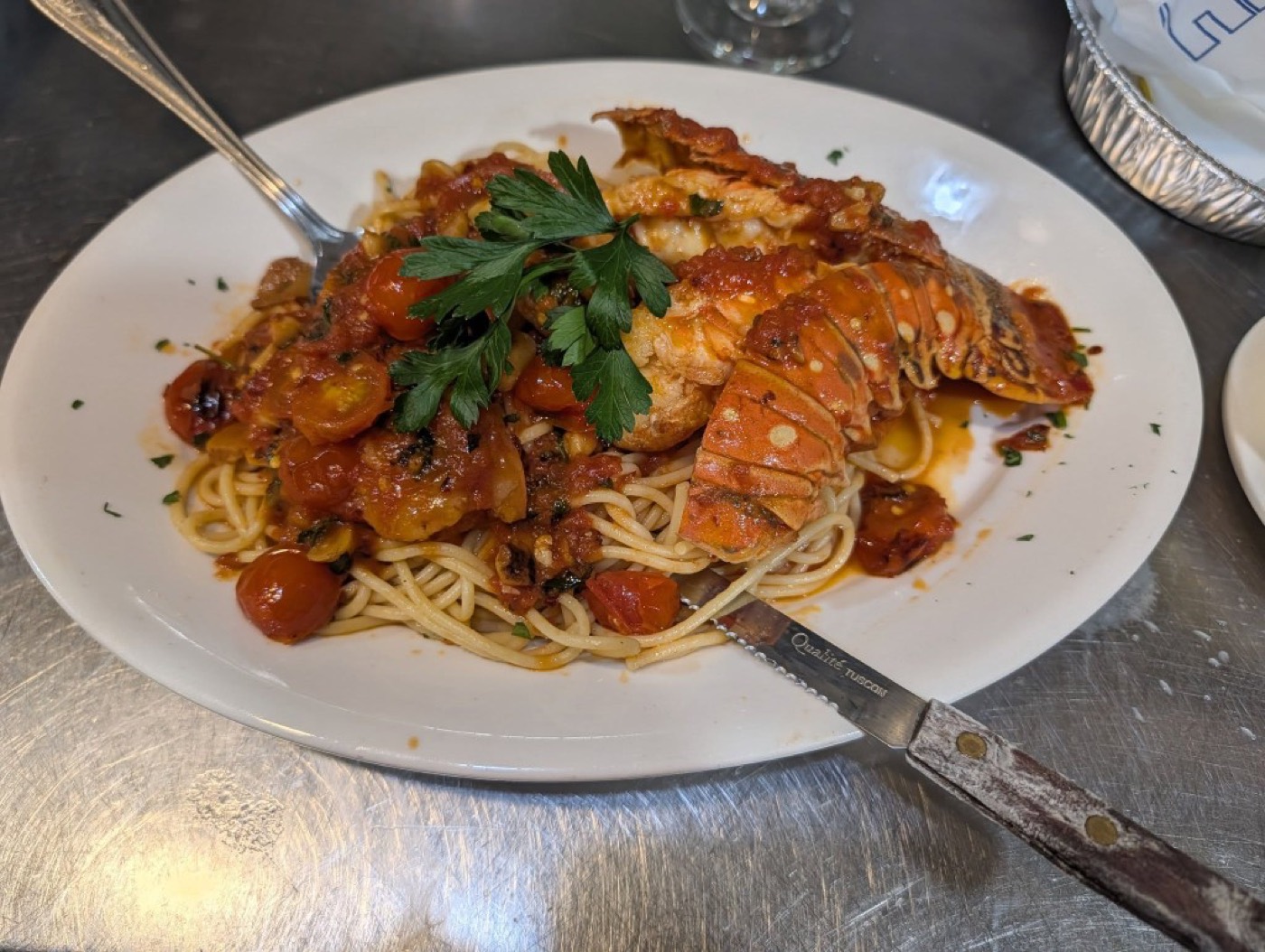 Lobster in a cherry tomato sauce over linguine.